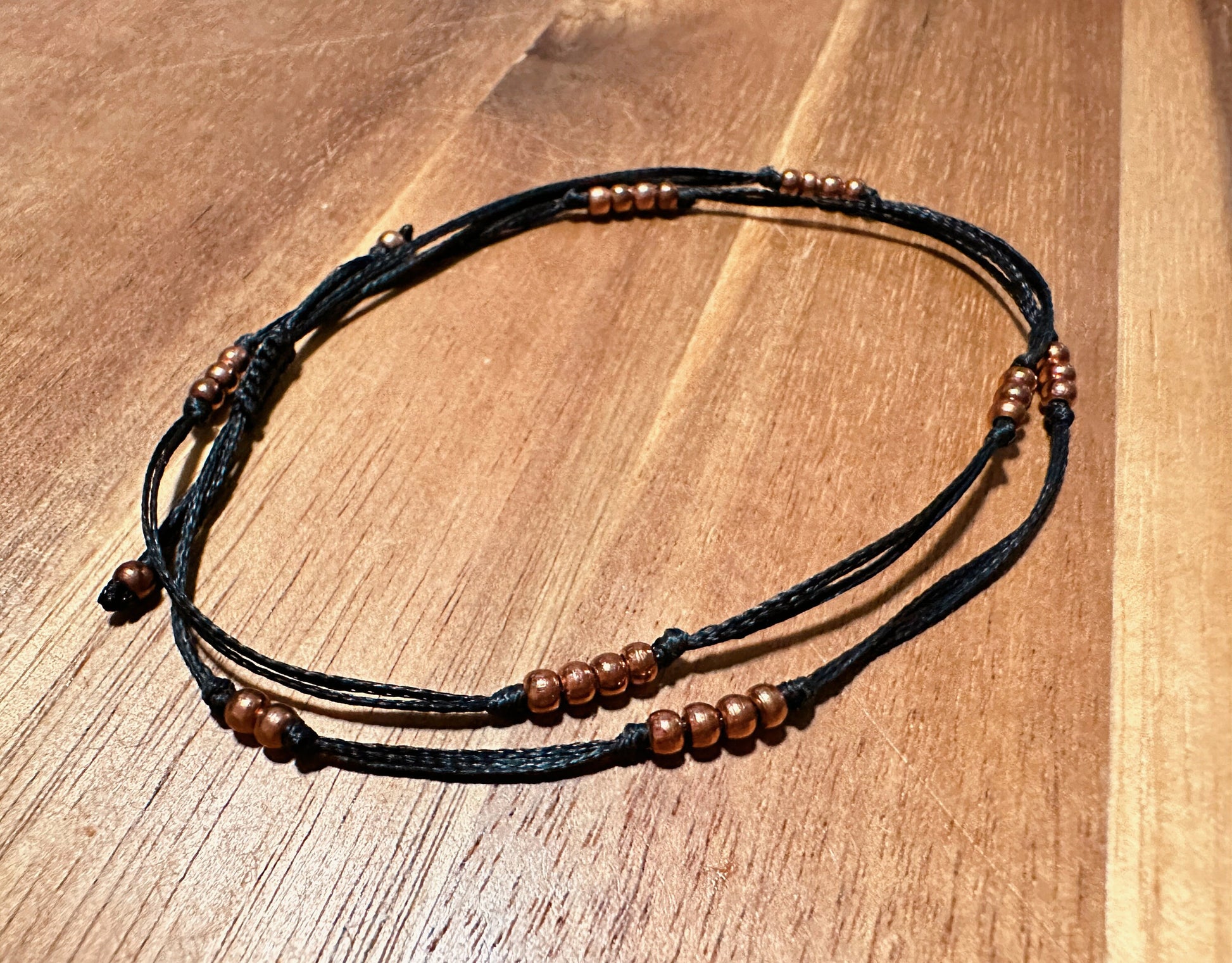 Layering bracelet, double stranded, on strong waxed cord, designed with copper beads, bead bracelet, metal beads