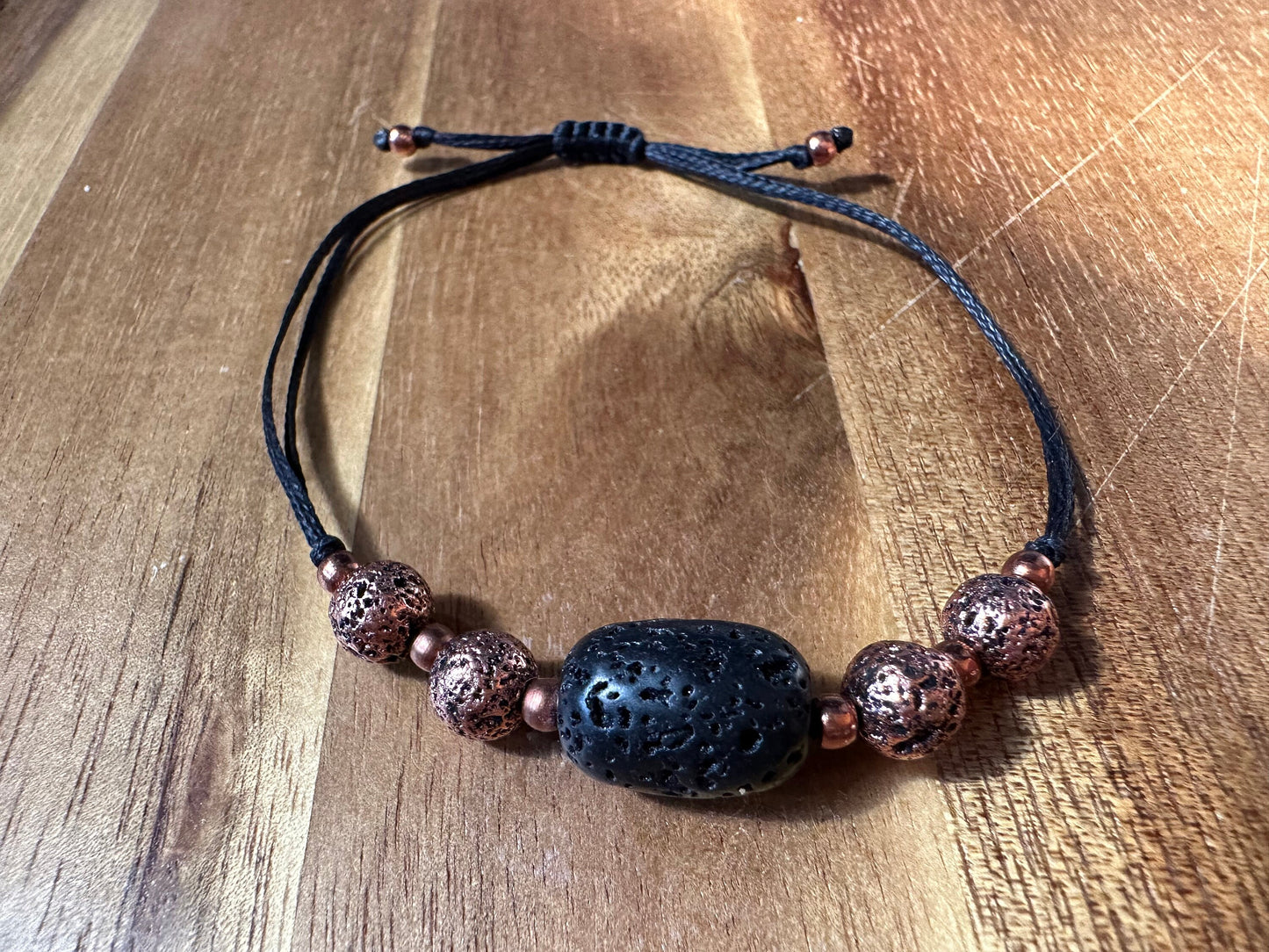 Volcanic Lava Rock essential oil bracelet, with titanium electro plated, copper coated Lava rock, copper spacer beads, therapeutic bracelet