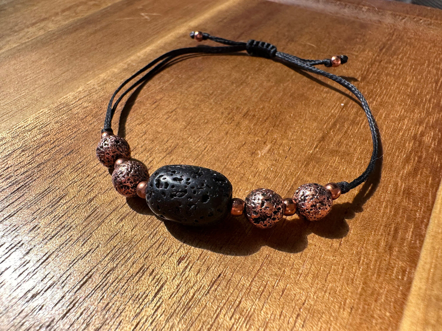 Volcanic Lava Rock essential oil bracelet, with titanium electro plated, copper coated Lava rock, copper spacer beads, therapeutic bracelet