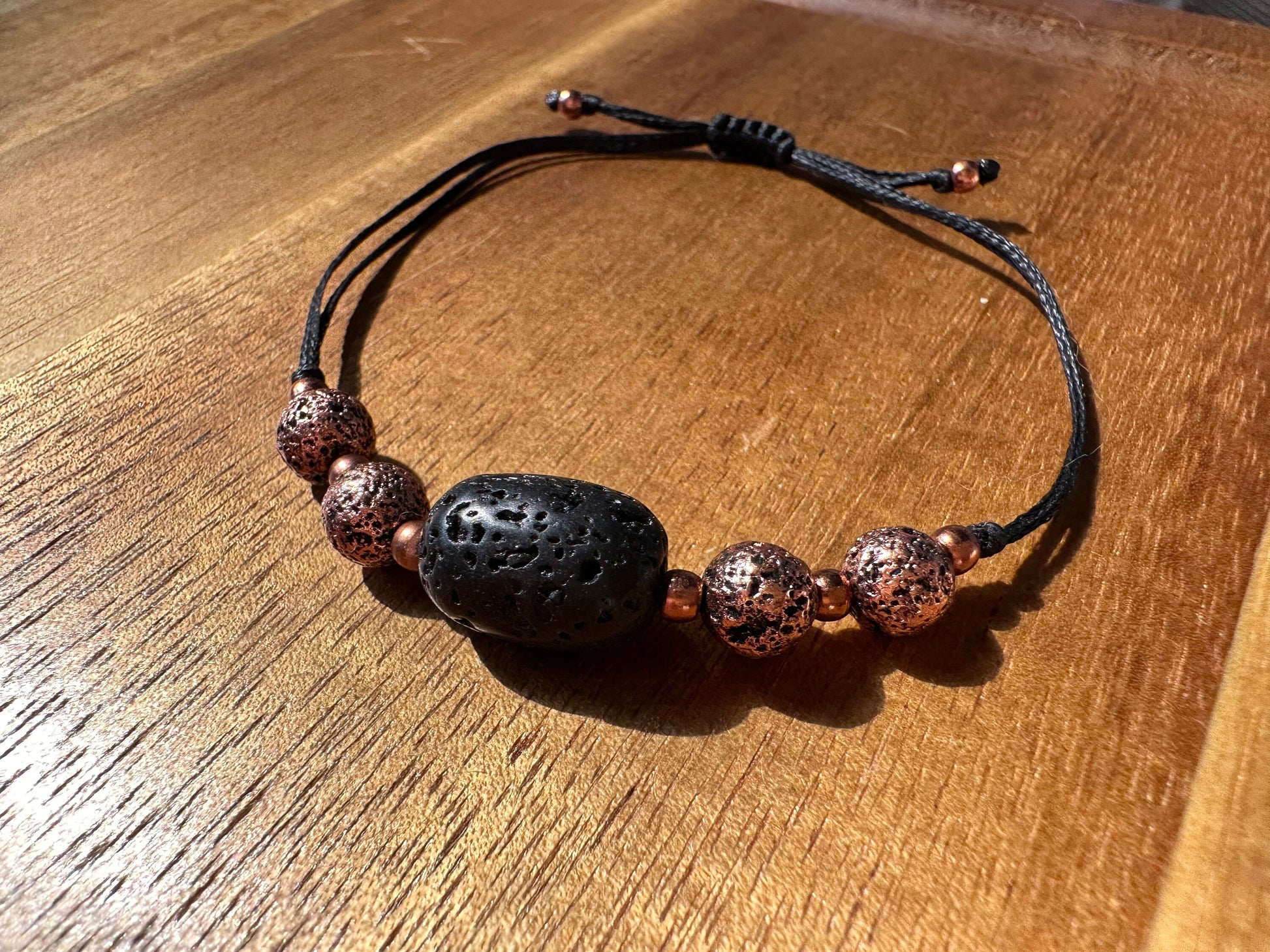 Volcanic Lava Rock essential oil bracelet, with titanium electro plated, copper coated Lava rock, copper spacer beads, therapeutic bracelet