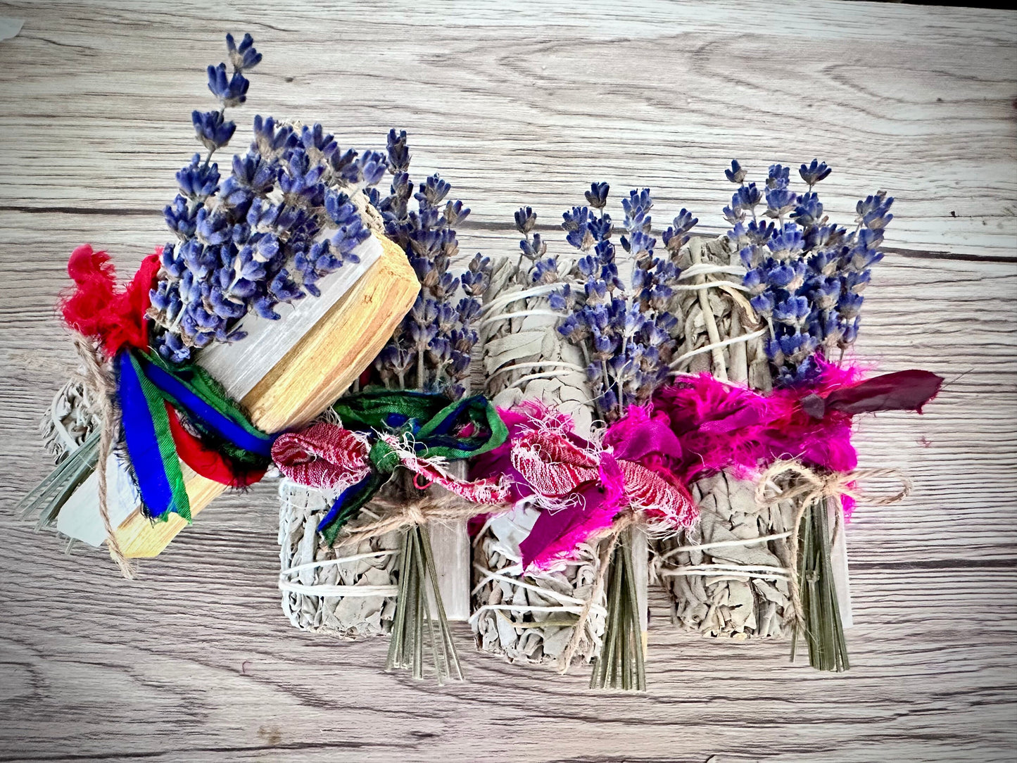 Healing smudge bundle. Includes selenite, Palo Santo, dried lavender, and white sage, wrapped in Sari silk.