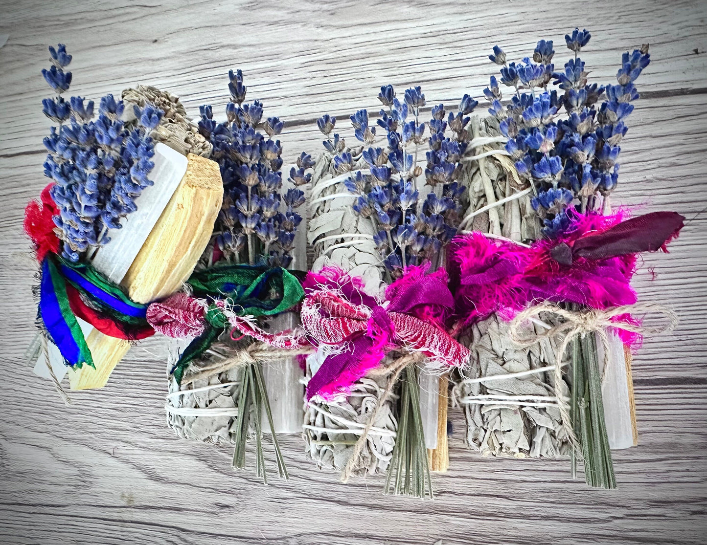 Healing smudge bundle. Includes selenite, Palo Santo, dried lavender, and white sage, wrapped in Sari silk.