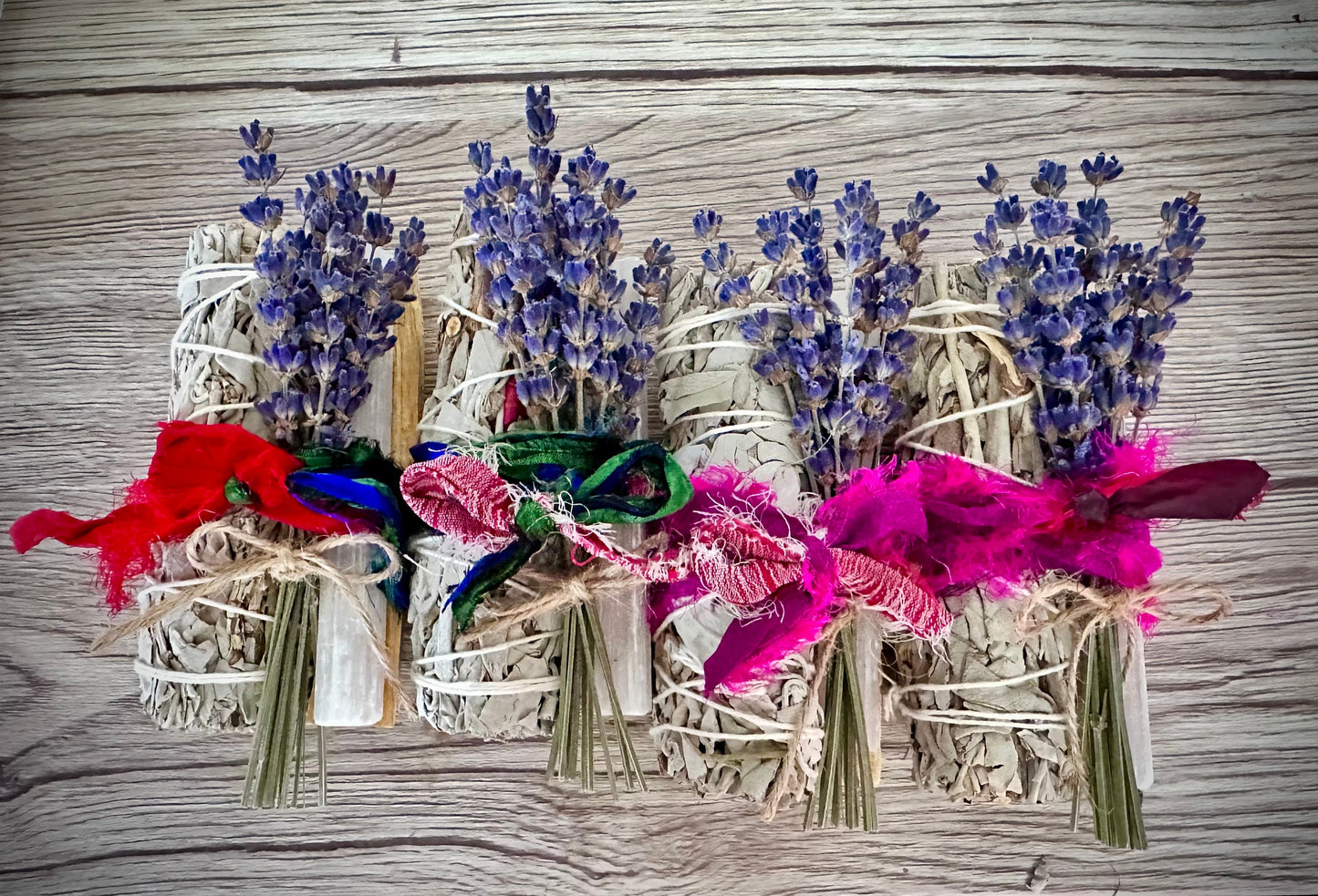 Healing smudge bundle. Includes selenite, Palo Santo, dried lavender, and white sage, wrapped in Sari silk.