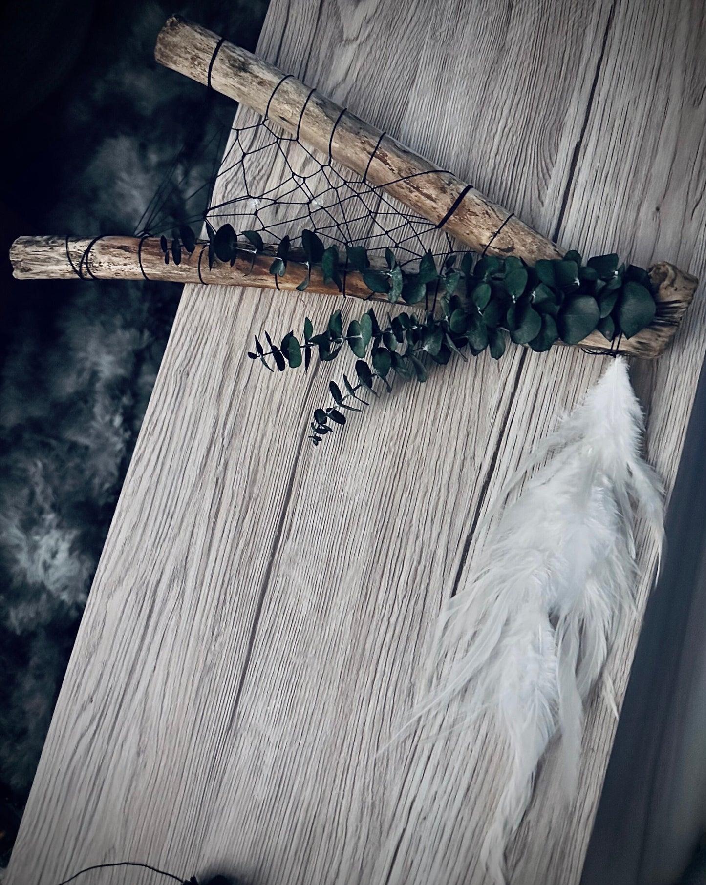 Boho reclaimed forest wood dreamcatcher with preserved fragrant eucalyptus and feathers. Gorgeous forest wood that can hang on the wall with nails, or I can attach a cord to hang it with, it can be made with hooks underneath to hand small items.