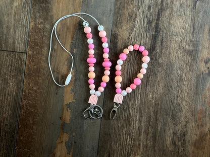 Cute pink silicone bead lanyard with soft, quality silicone beads adorable focal bead and clasp options id badge lanyard with break away clasp for teachers nurses and professionals adult pink and iridescent pearl silicone beads. Silk cord for comfort