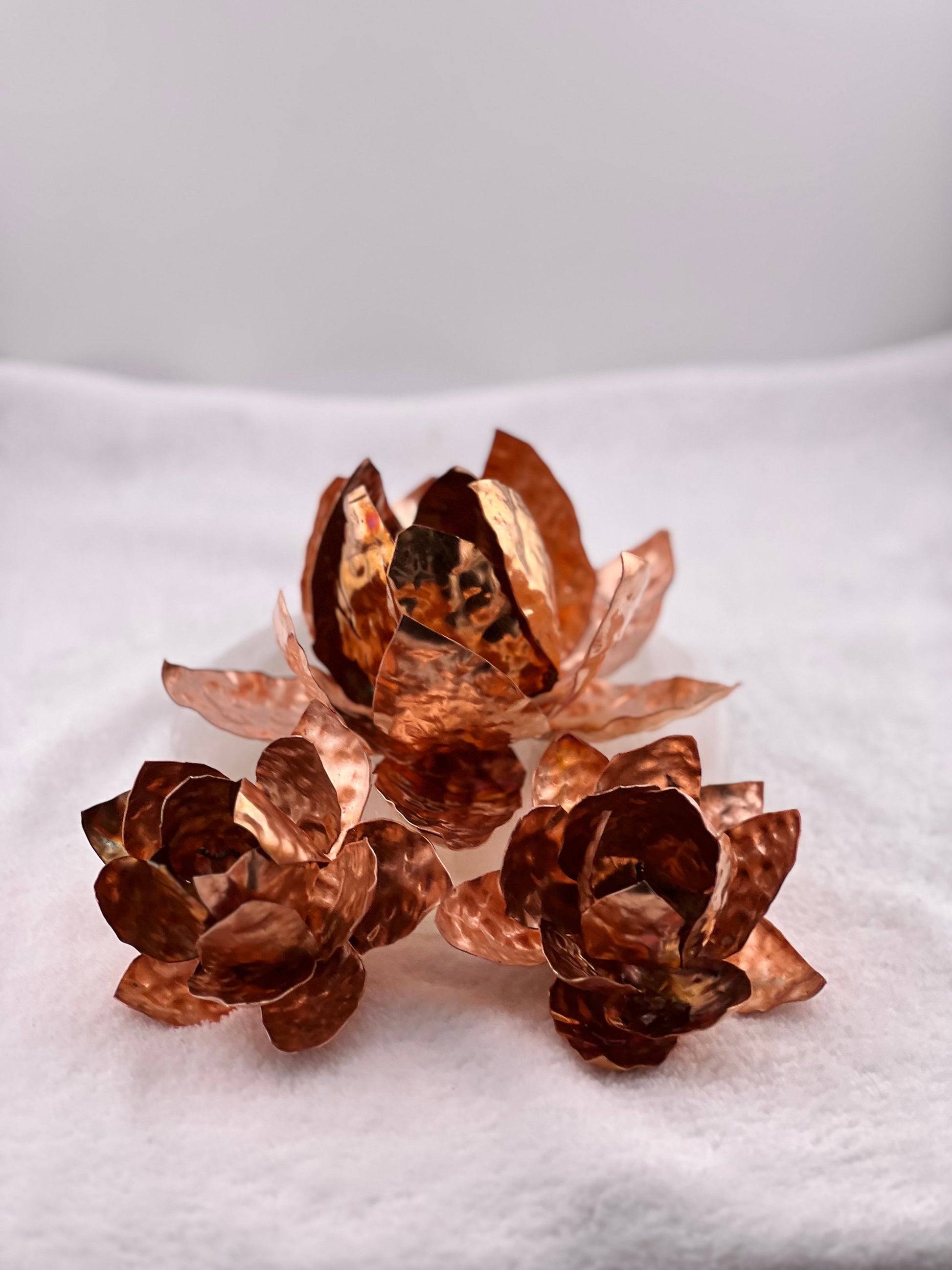 A small, medium, and large pure copper lotus flower bundle for home decor garden decoration, wedding centerpiece or wall hang! Handmade and one of a kind copper flower.